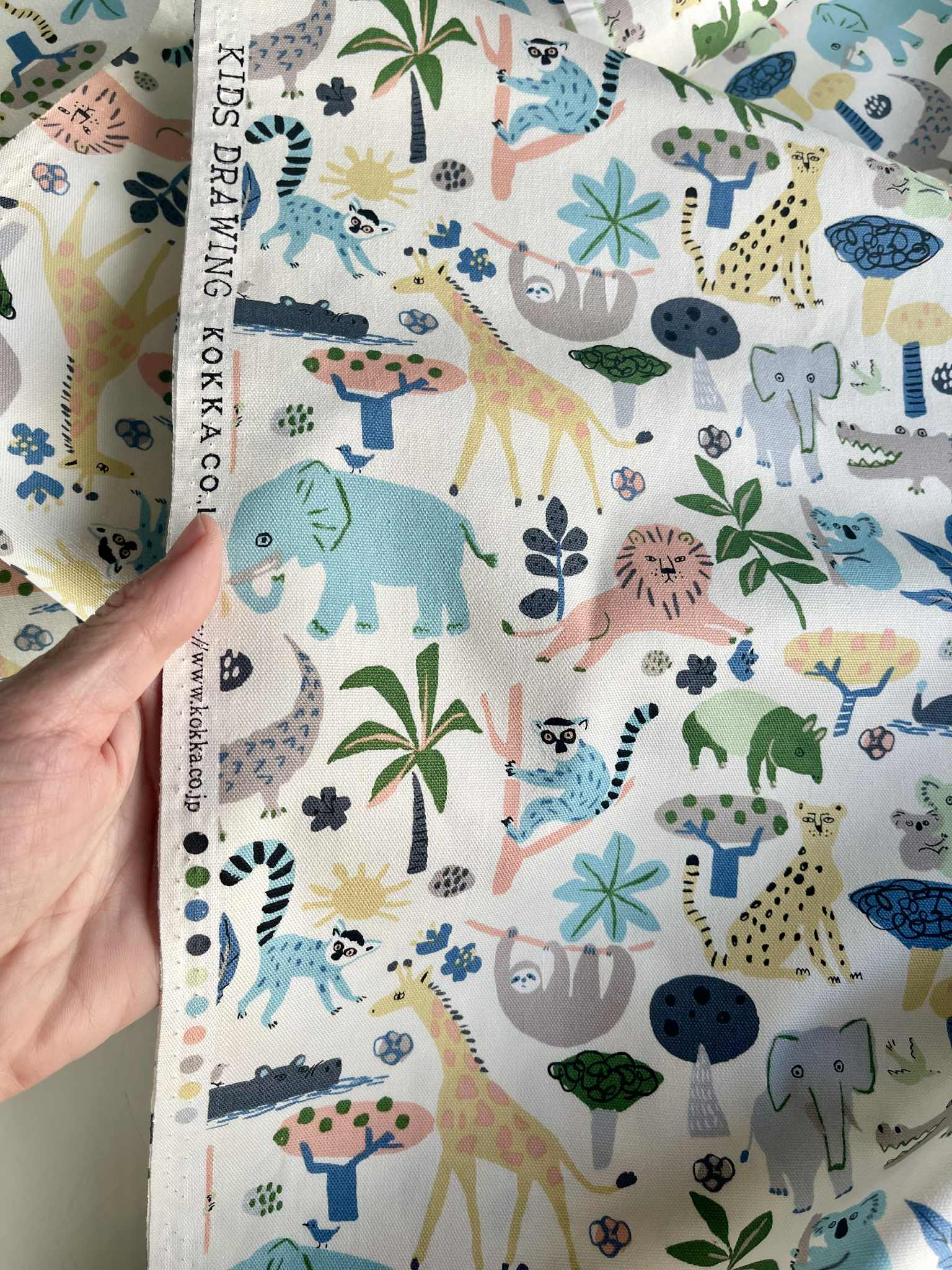Loneta Oxford de animales safari pastel