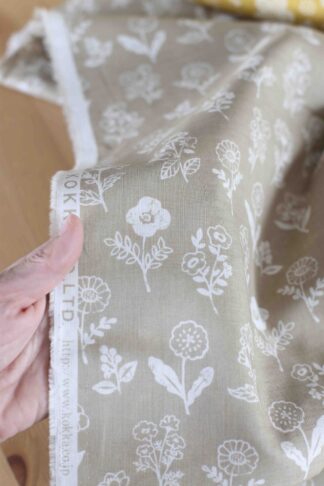 Algodón floral beige y crema